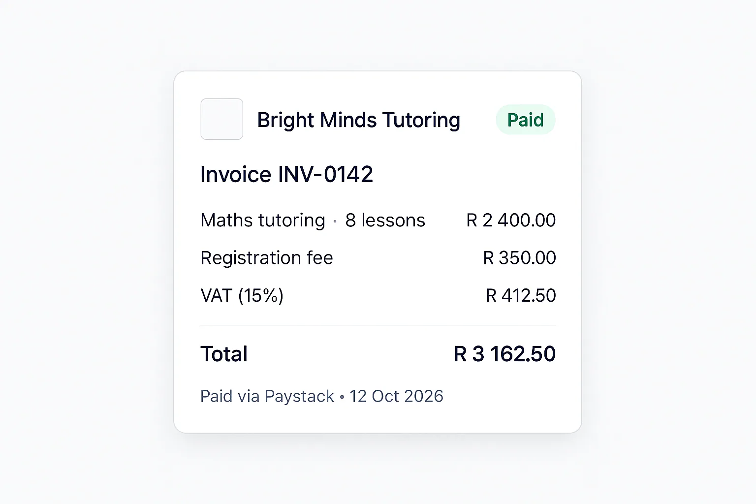 A paid invoice with a VAT line, paid via Paystack